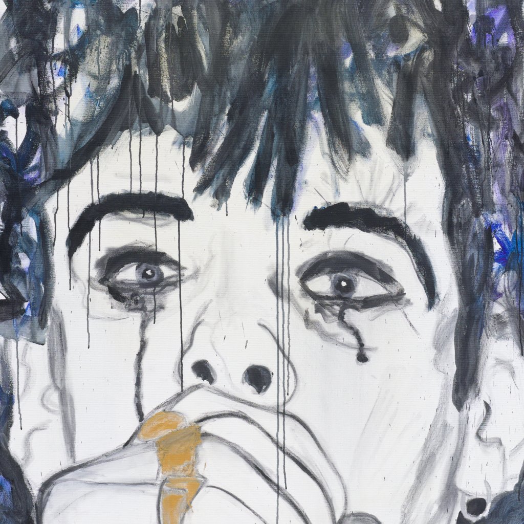 Young Nick Crying into a microphone